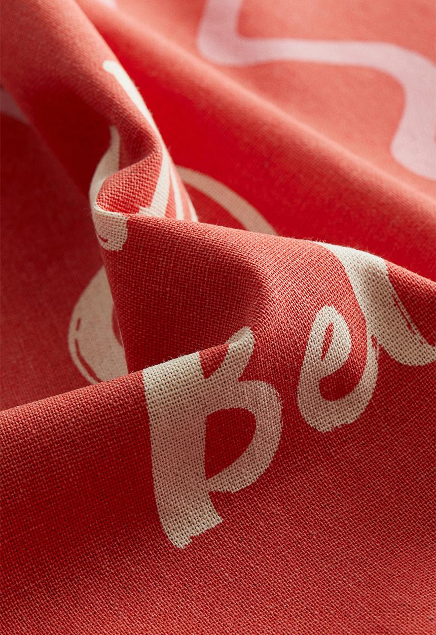 H&M - Printed cotton cushion cover - coral red/ciao bella