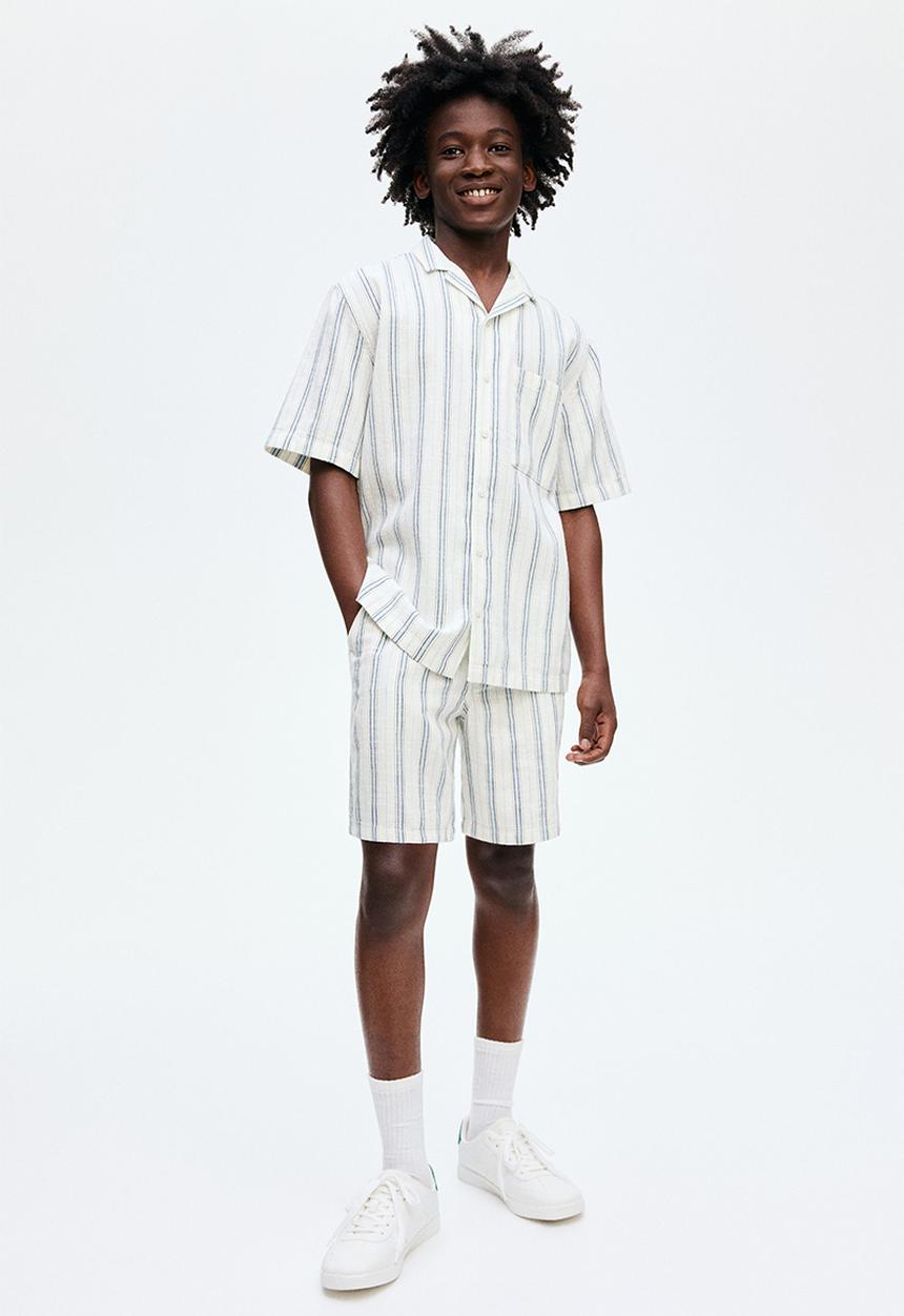 H&M - Cotton shorts - light blue/white striped 