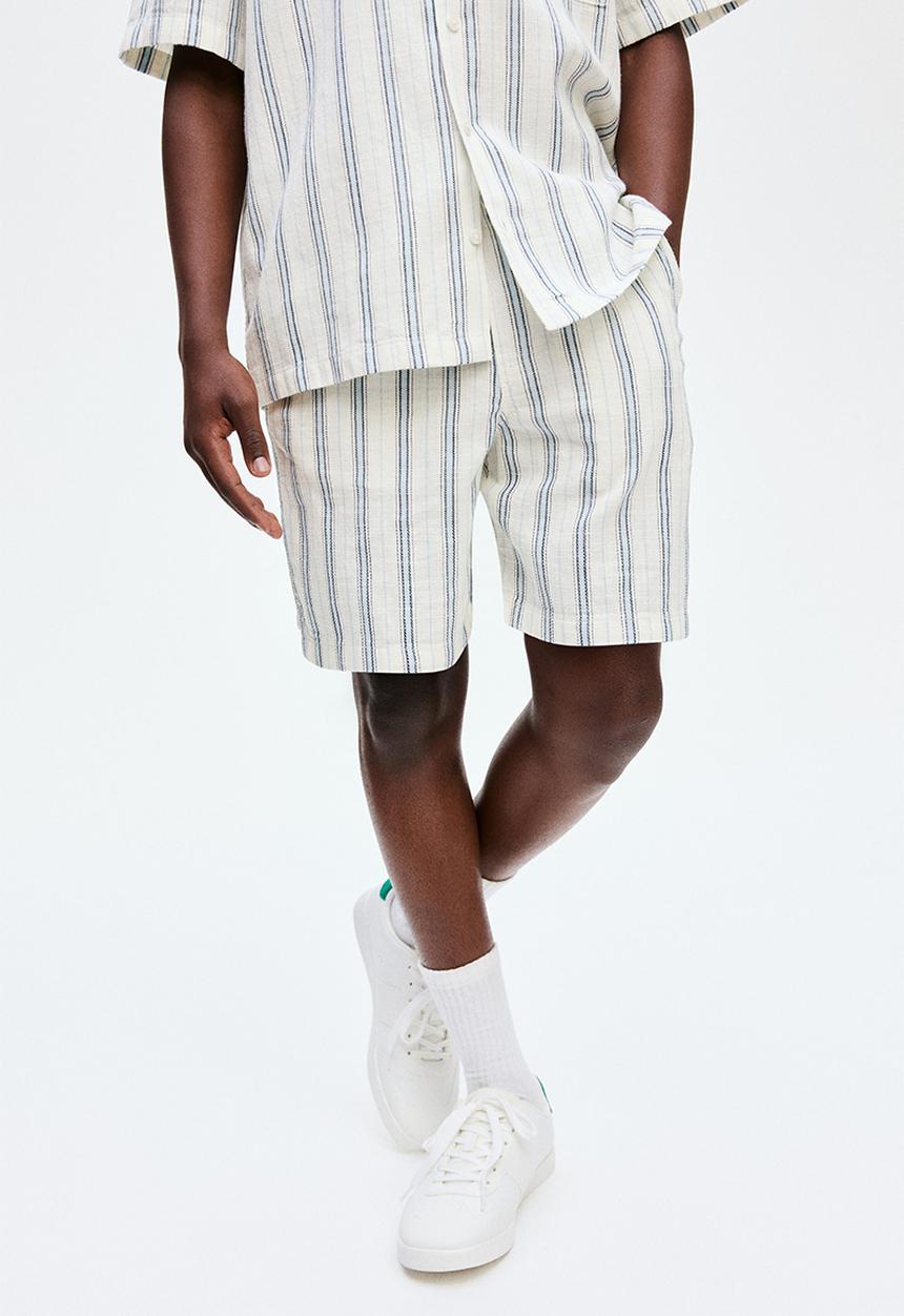 H&M - Cotton shorts - light blue/white striped 