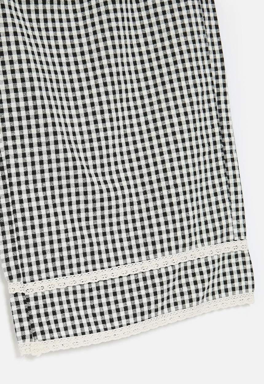 Pop Candy - Wide leg pants with lace knit trim - black gingham
