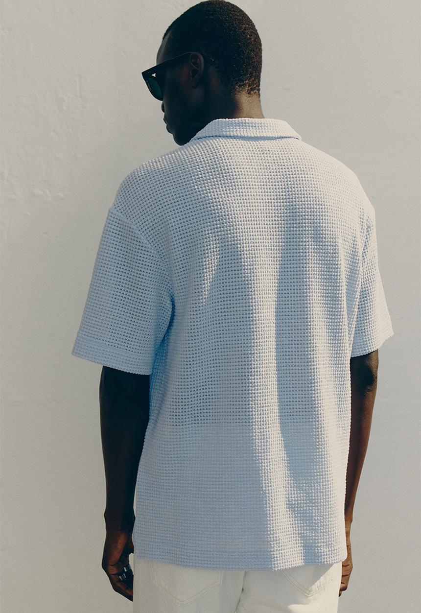 H&M - Loose fit waffled polo shirt - light blue