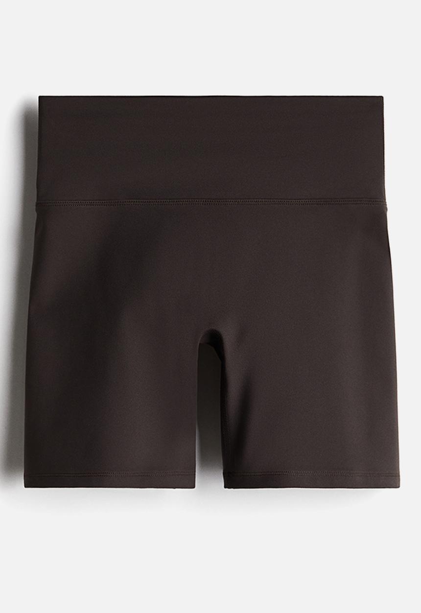 H&M - Sports cycling shorts with softmove™ - brown