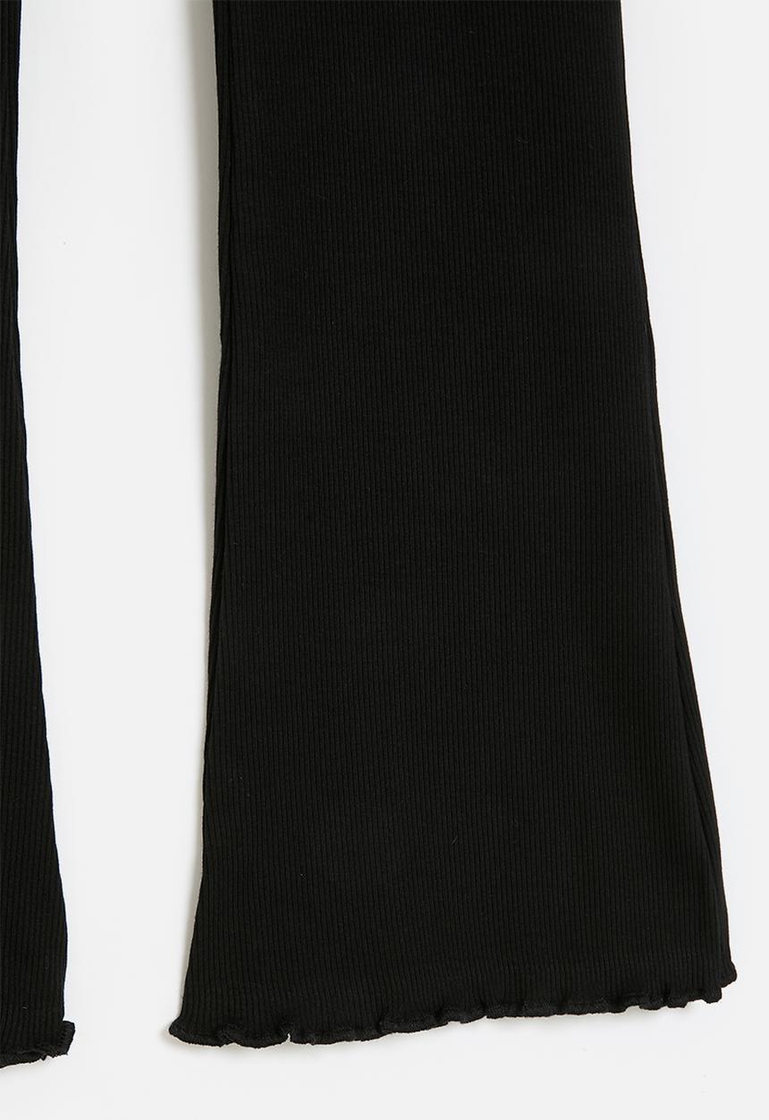 Pop Candy - Flared leggings - black