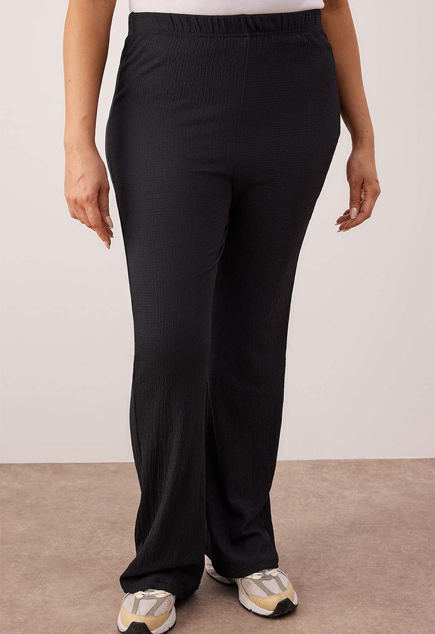 Trendyol - Plus size high waist flare leg pants - black
