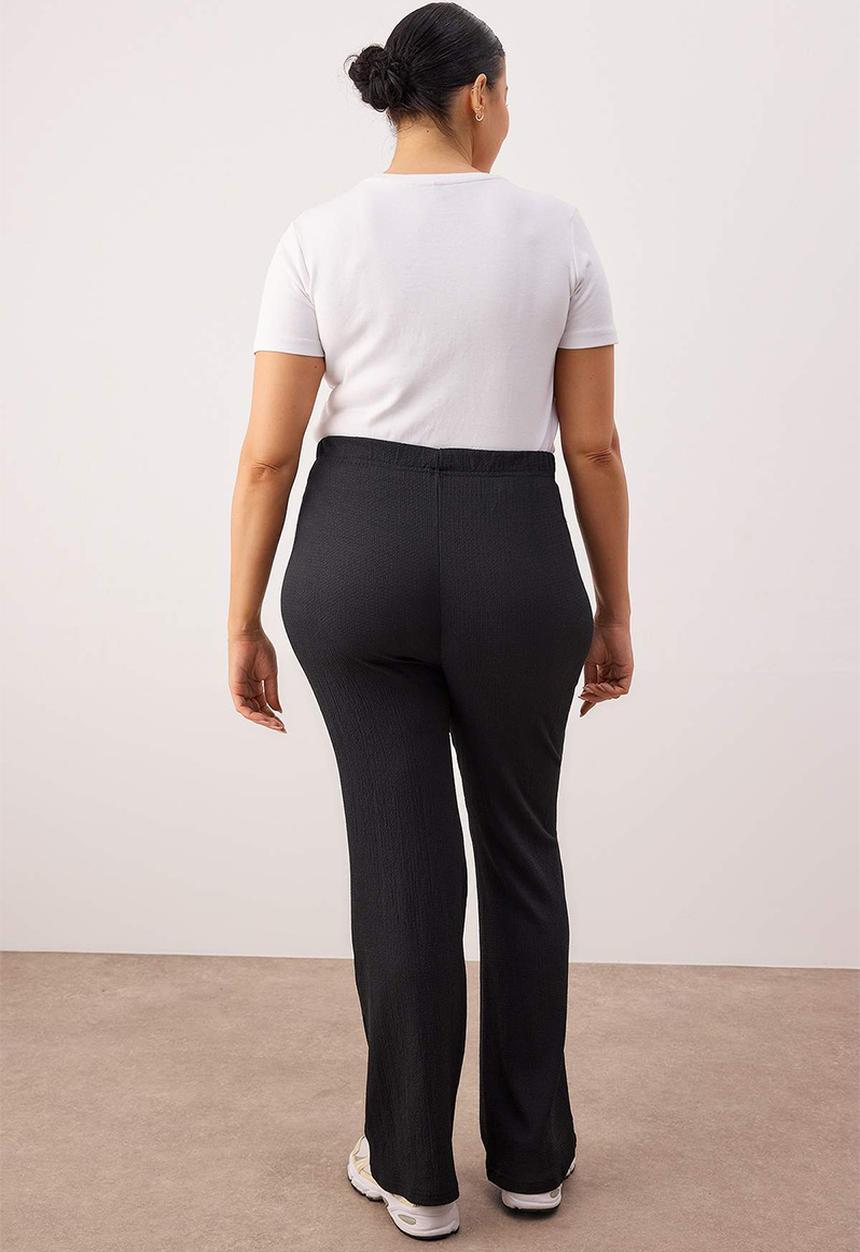 Trendyol - Plus size high waist flare leg pants - black