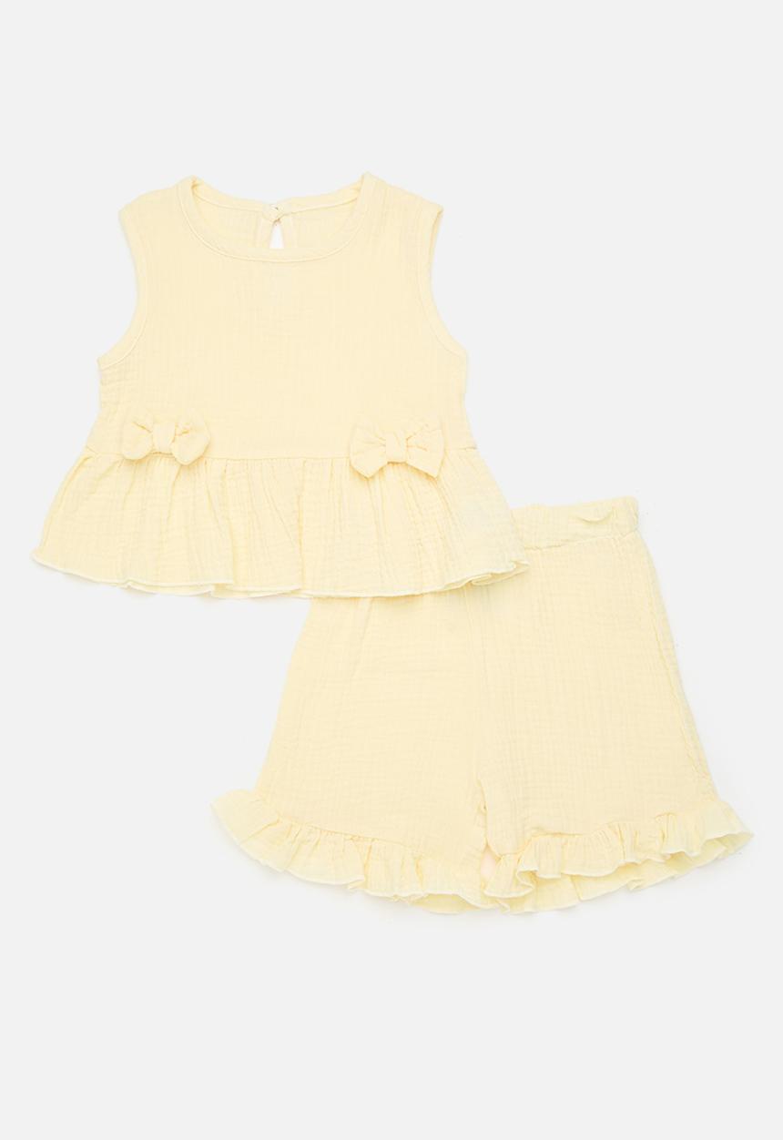 Pop Candy - Peplum top with bow detail & frilled hem shorts - lemon chiffon