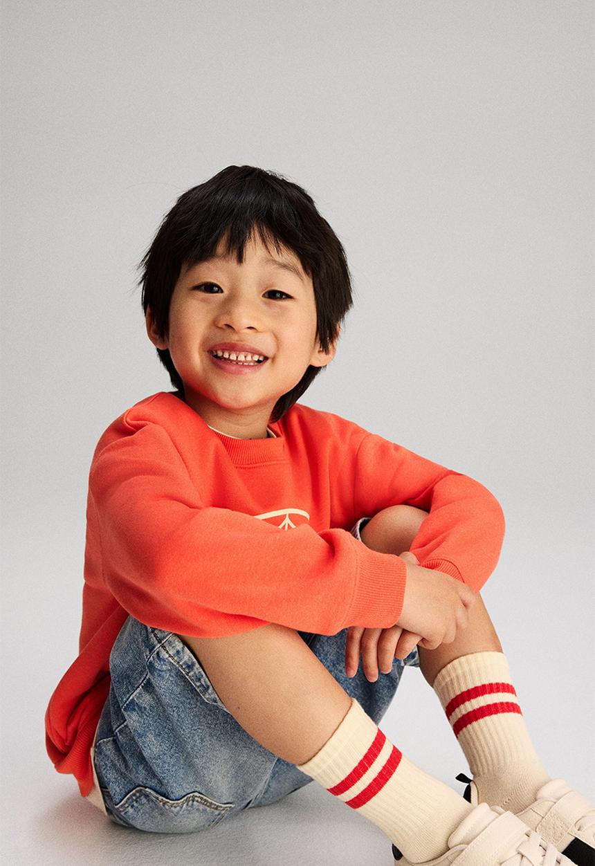 H&M - Printed sweatshirt - orange/marvel