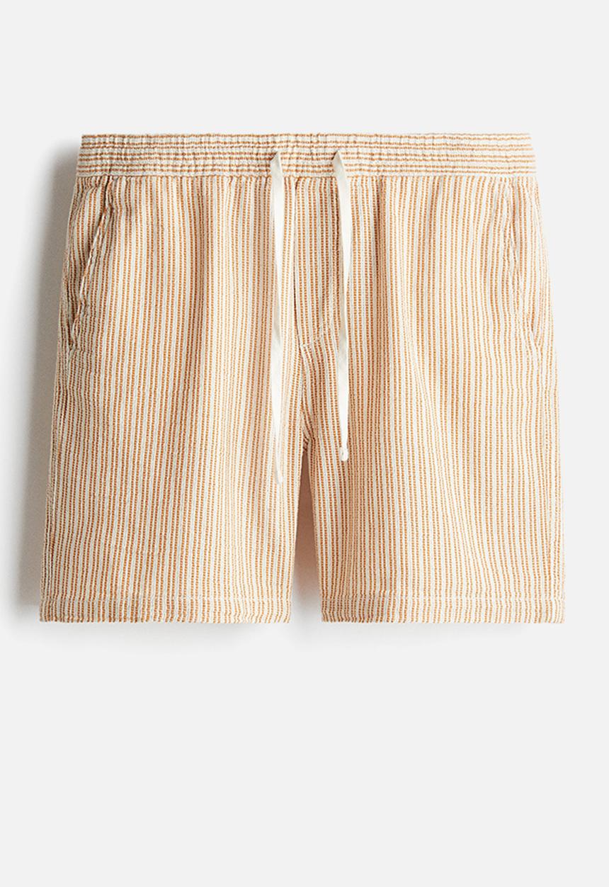 H&M - Regular fit woven shorts - yellow striped