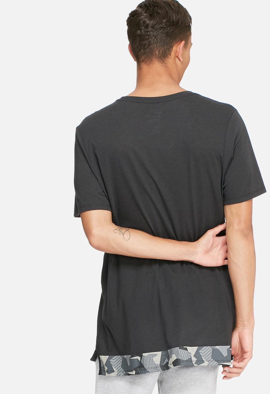Nike - Badlands drop hem tee