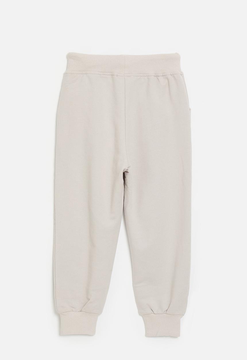 Pop Candy - Graphic and slogan print jogger - beige/dinosaur club