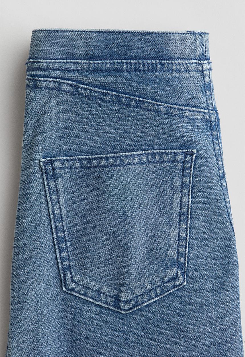 H&M - Wide denim-look trousers - denim blue/mickey mouse 