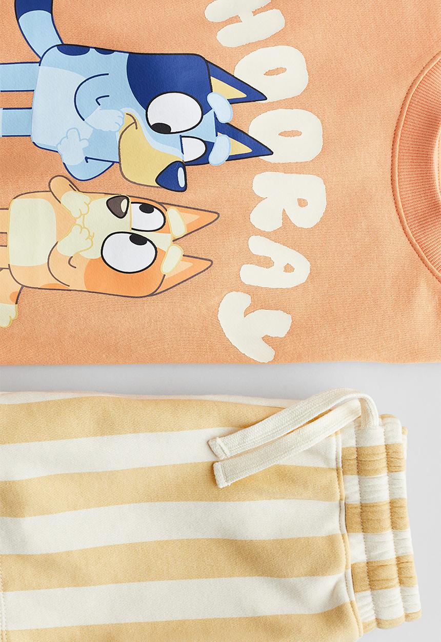 H&M - 2-piece printed sweatshirt set -  light orange/bluey