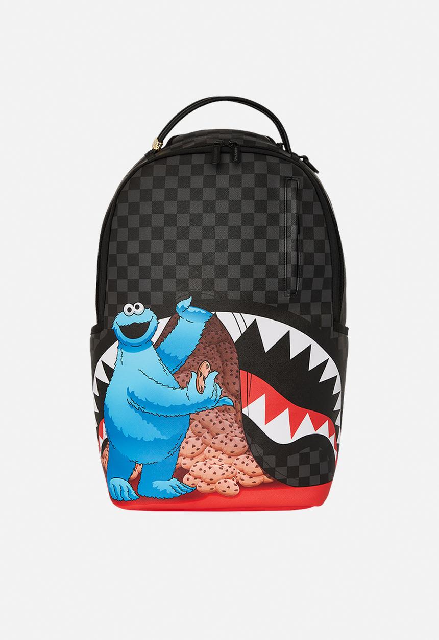 Sprayground - Sesame street cookie monster sneaking a bite dlxsv backpack - black