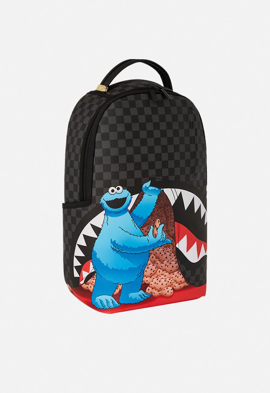 Sprayground - Sesame street cookie monster sneaking a bite dlxsv backpack - black