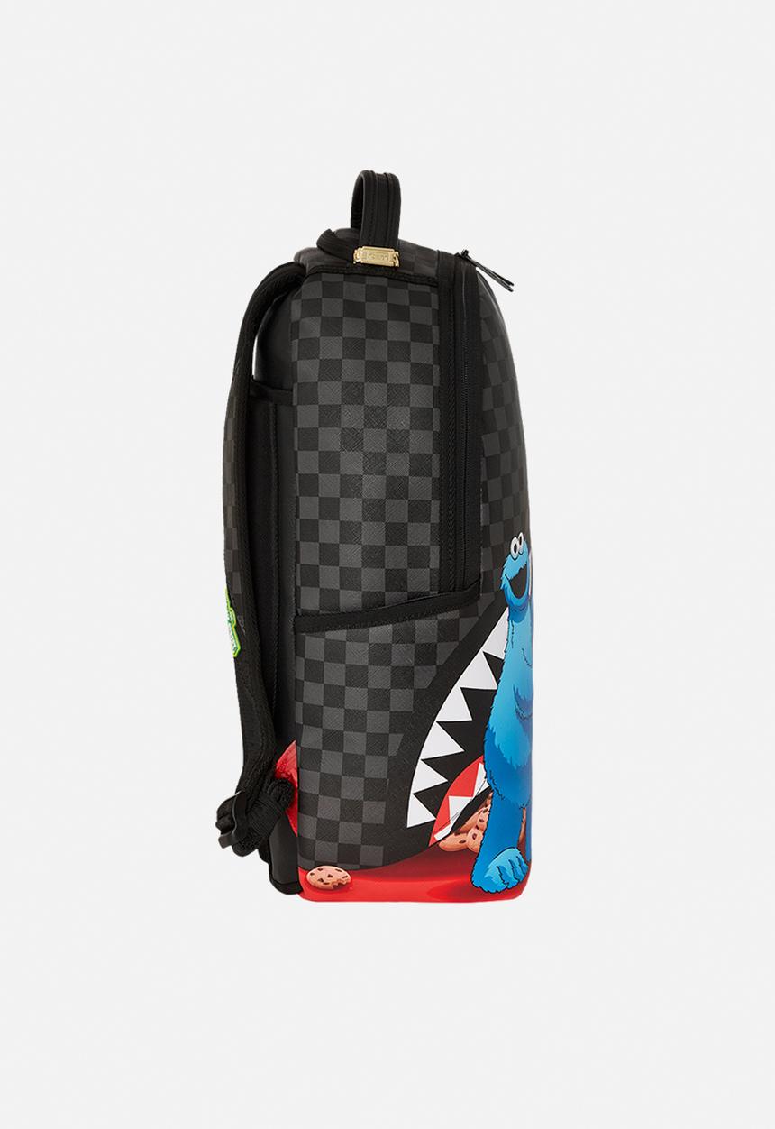 Sprayground - Sesame street cookie monster sneaking a bite dlxsv backpack - black
