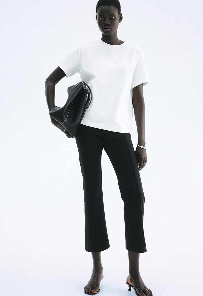 H&M - Flared crease-front trousers - black