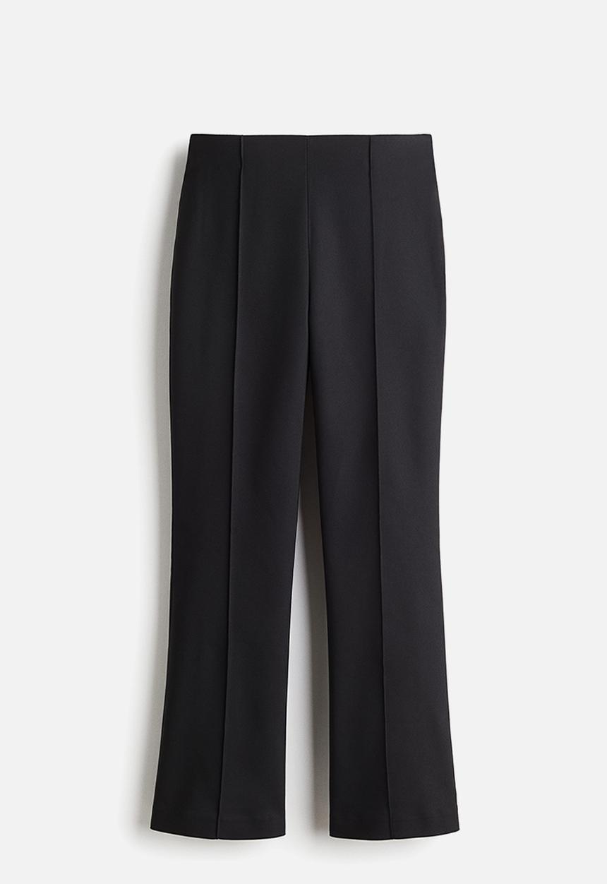 H&M - Flared crease-front trousers - black