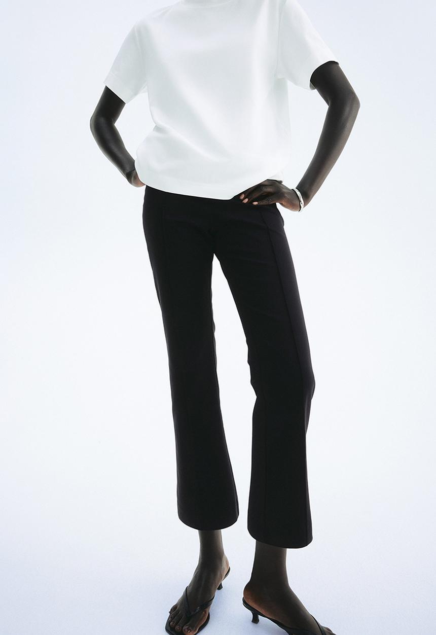 H&M - Flared crease-front trousers - black