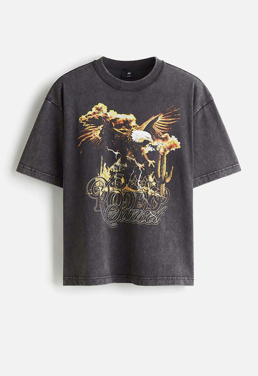 H&M - Loose fit printed t-shirt - vintage black rodeo sunset