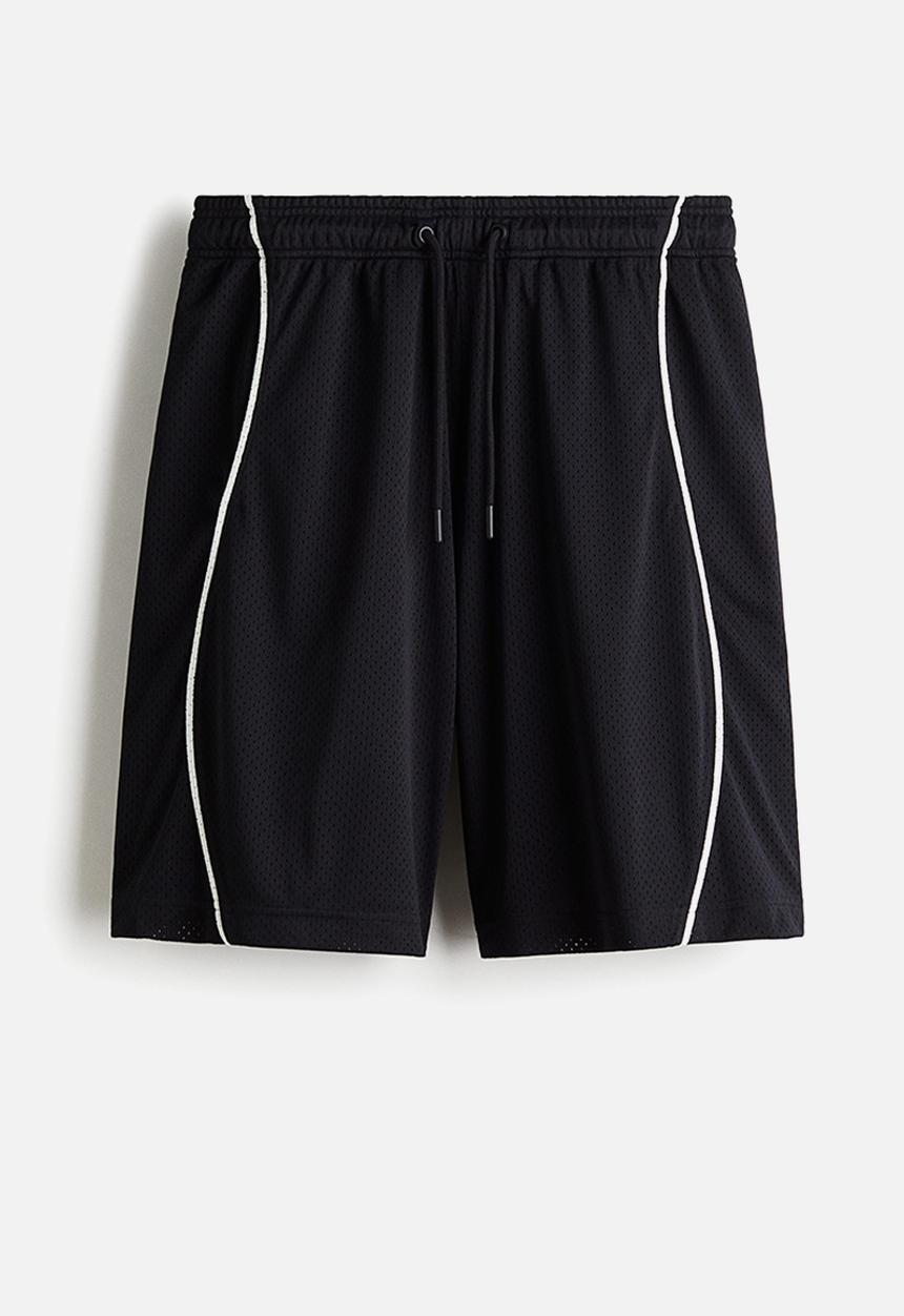 H&M - Relaxed fit mesh shorts - black