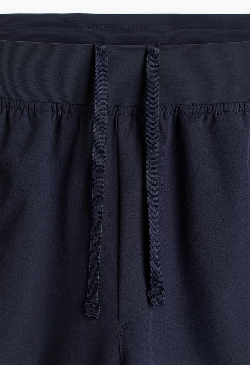 H&M - Mid-length sports shorts with drymove™ - navy blue
