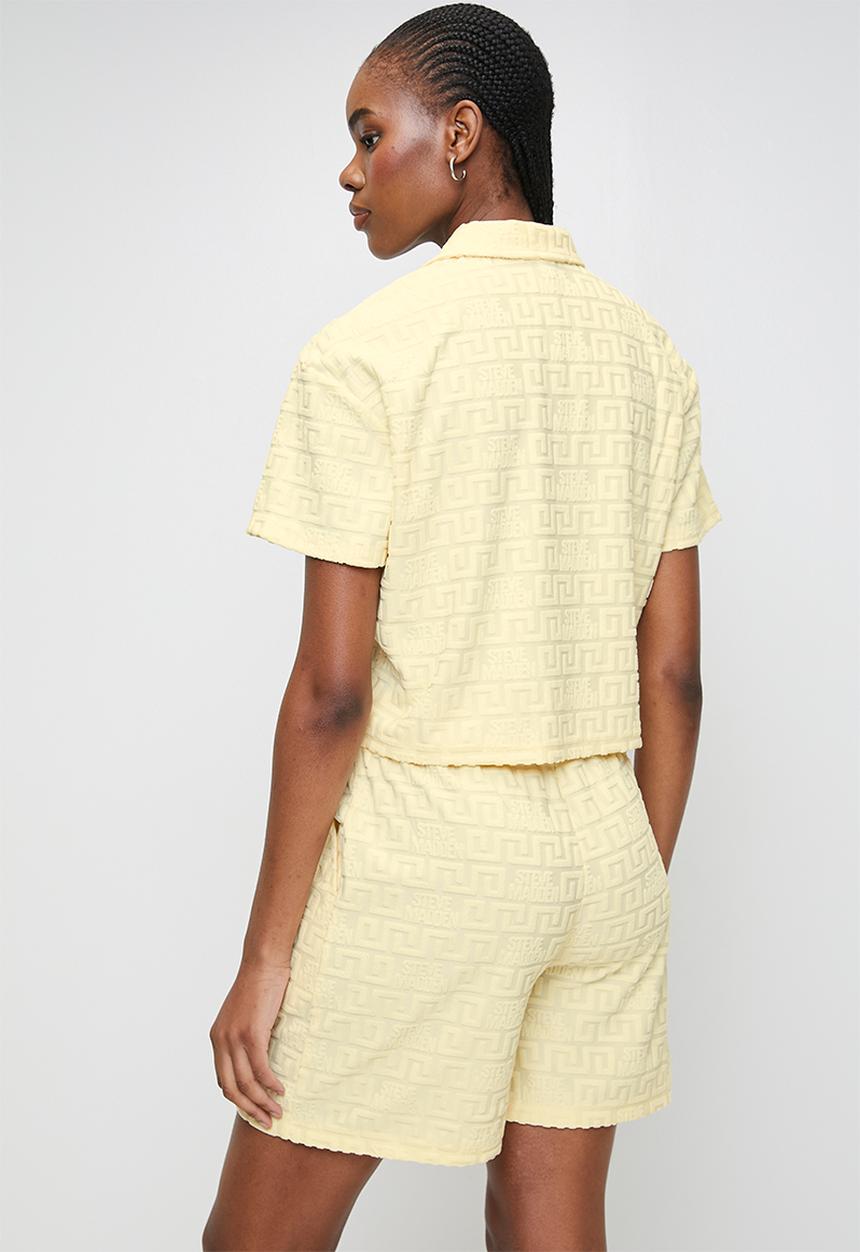 Steve Madden - Ladies tessa embossed logo top with collar - lemon