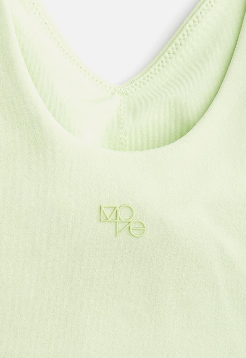 H&M - Medium support yoga bra with softmove™ lycra® - light green