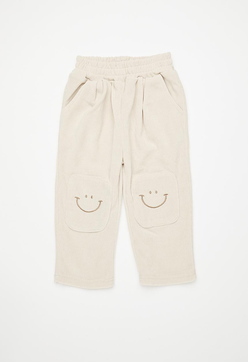 Pop Candy - Waffle knit pants with smiley face knee patches - ivory