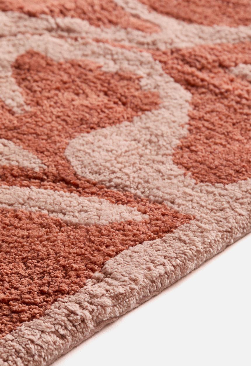 H&M - Tufted cotton bath mat -  rust red/floral