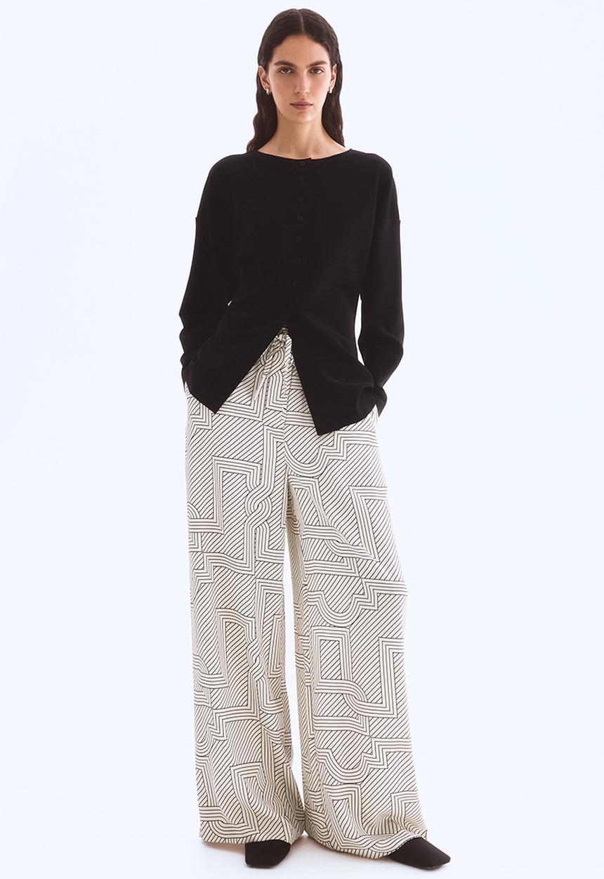 H&M - Wide trousers - cream patterned 