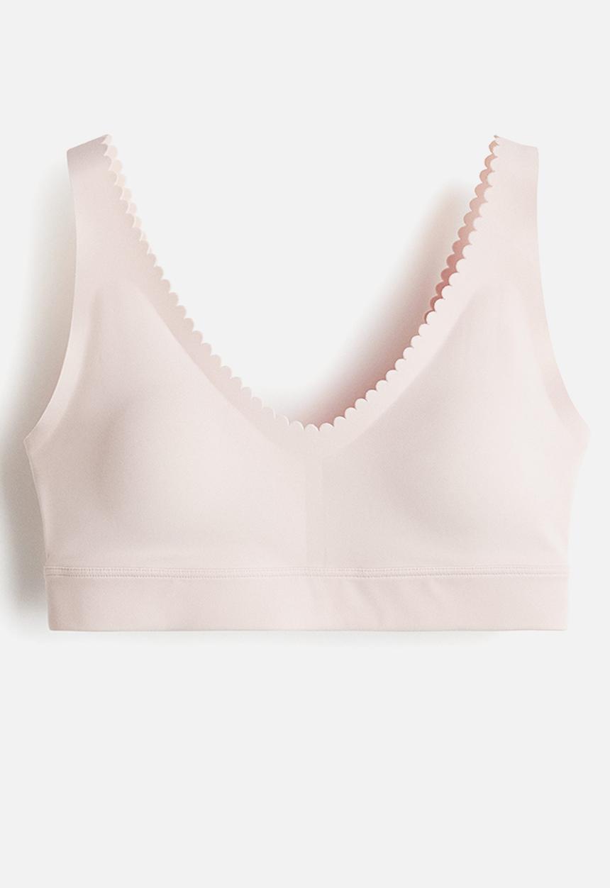 H&M - Medium support sports bra with softmove™ - soft pink