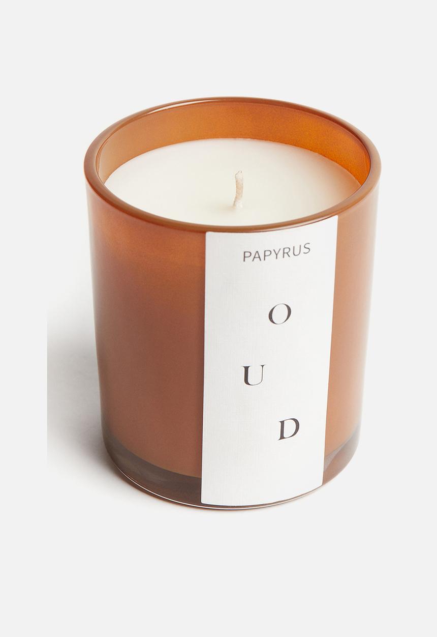 H&M - Scented candle in a glass holder - yellow