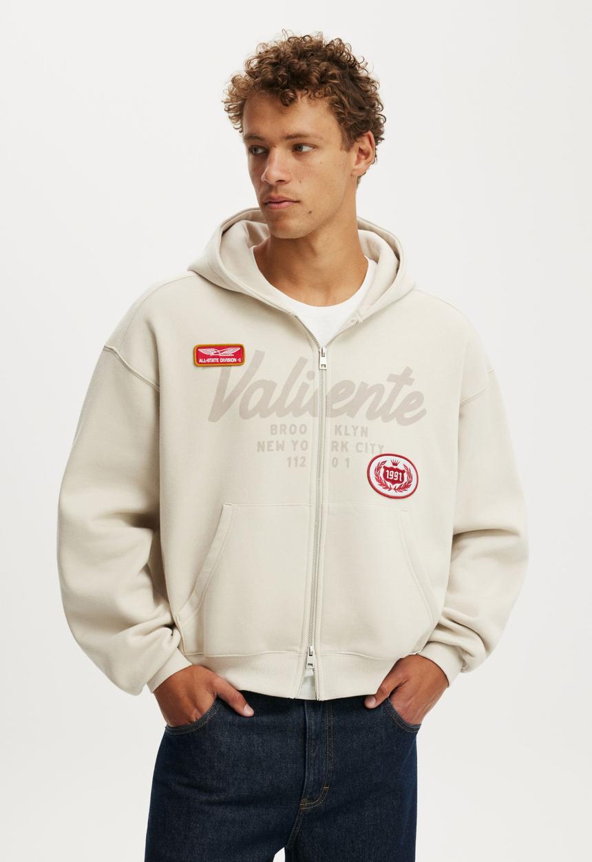 pxrgetrxxper 着用craigfiesta hoodie Cropped Zip Up Graphic Hoodie - Bone/ Valiente