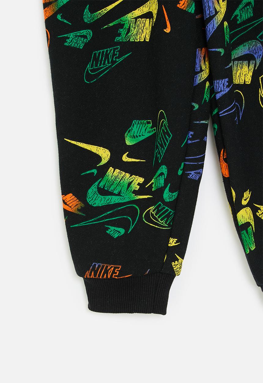 Nike - Nike all-over print reveal joggers - black