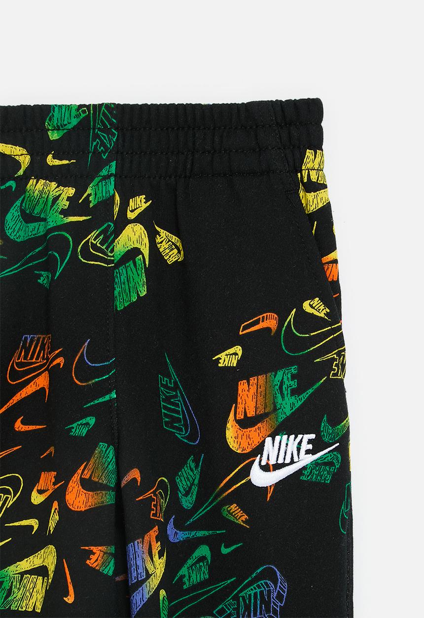 Nike - Nike all-over print reveal joggers - black