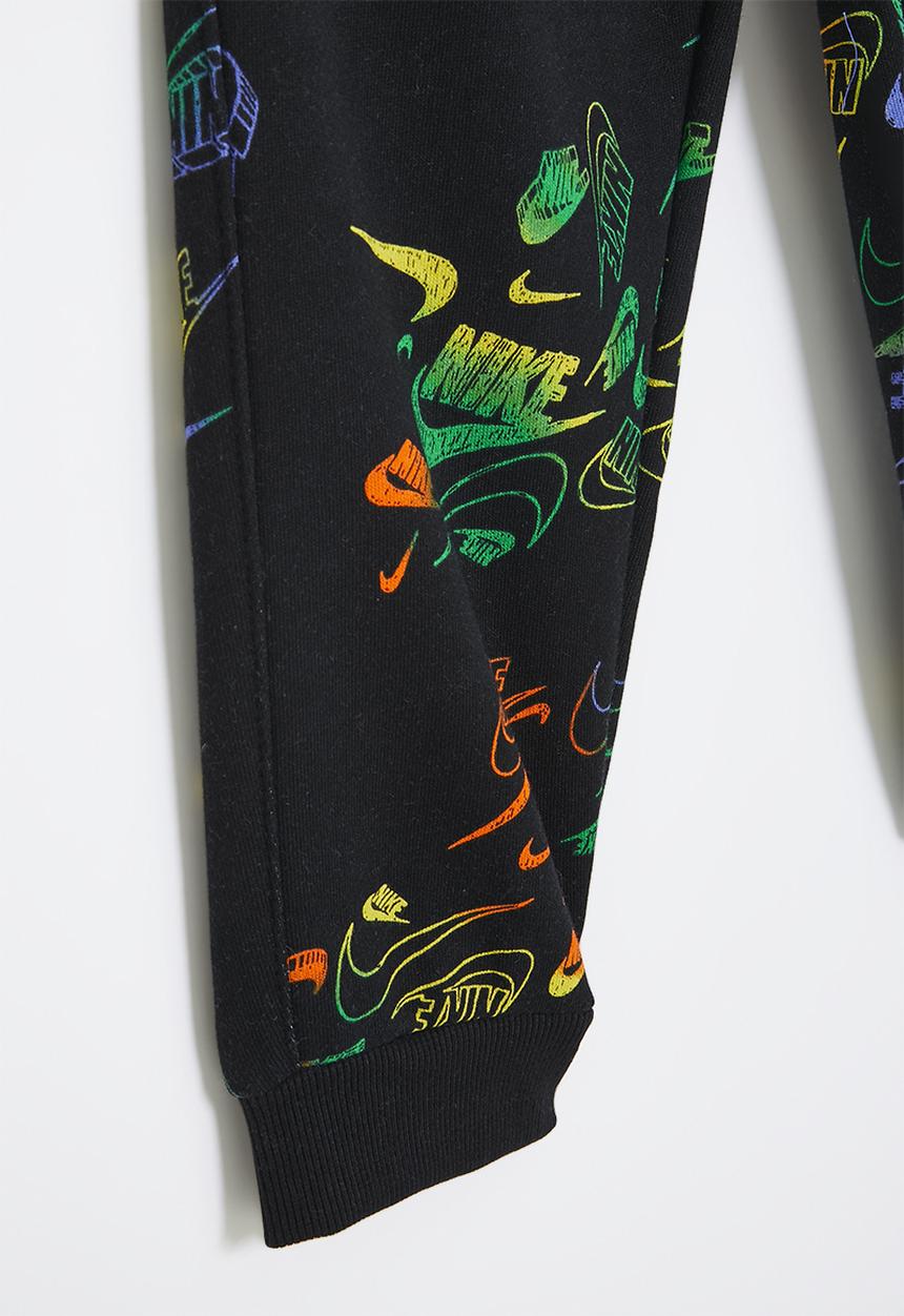 Nike - Nike all-over print reveal joggers - black