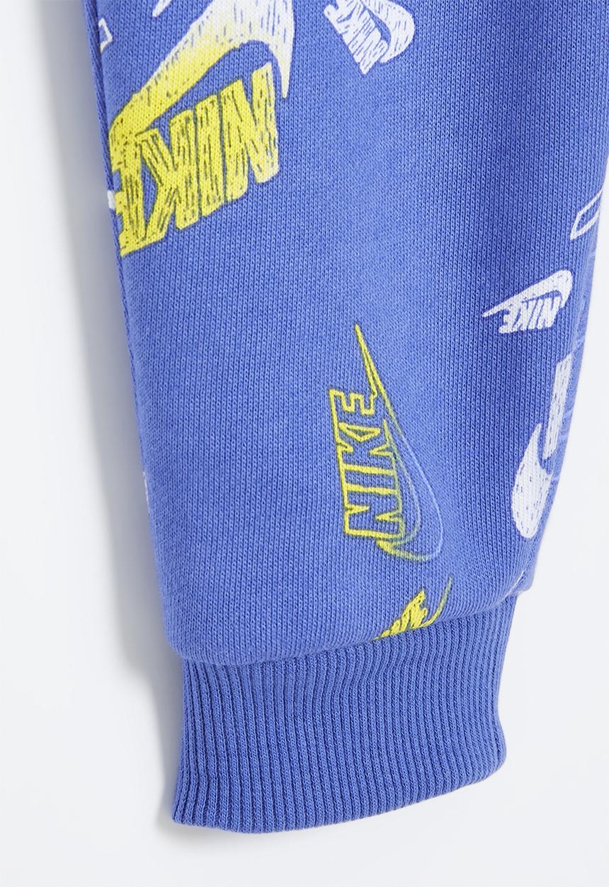 Nike - Nike all-over print reveal joggers - comet blue