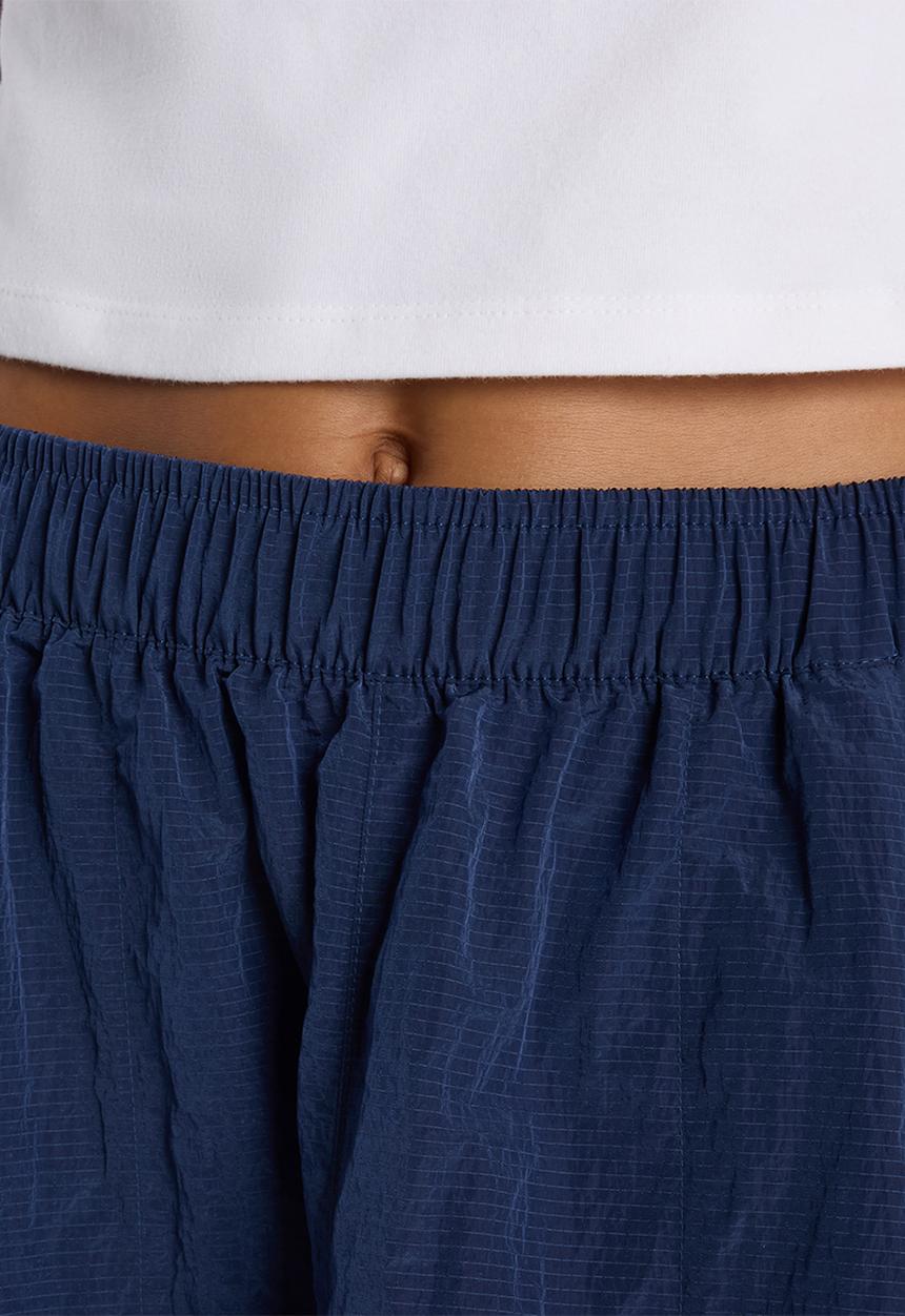 New Balance  - NB Athletics Sport Legacy Skirt - NB Navy