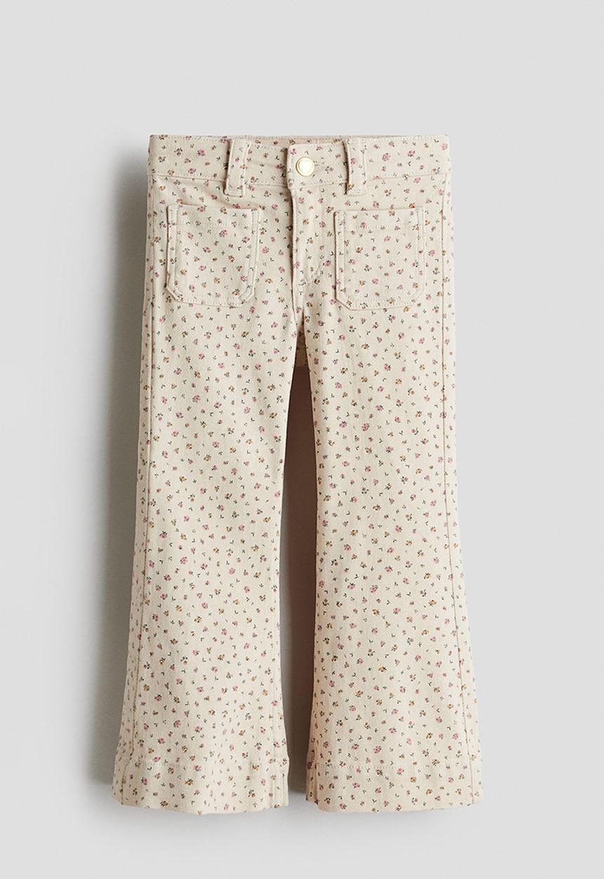 H&M - Flared leg jeans - light beige/floral