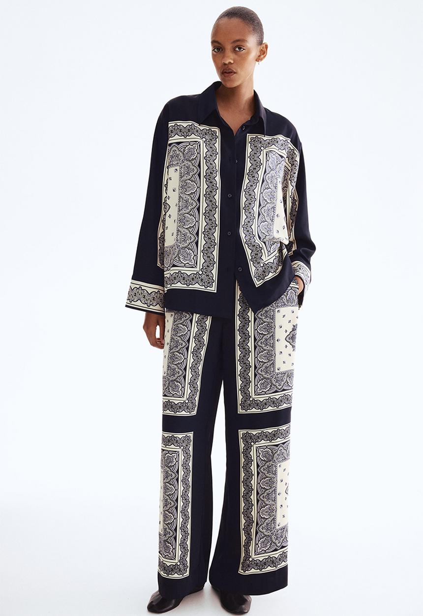H&M - Straight trousers - navy blue/patterned 