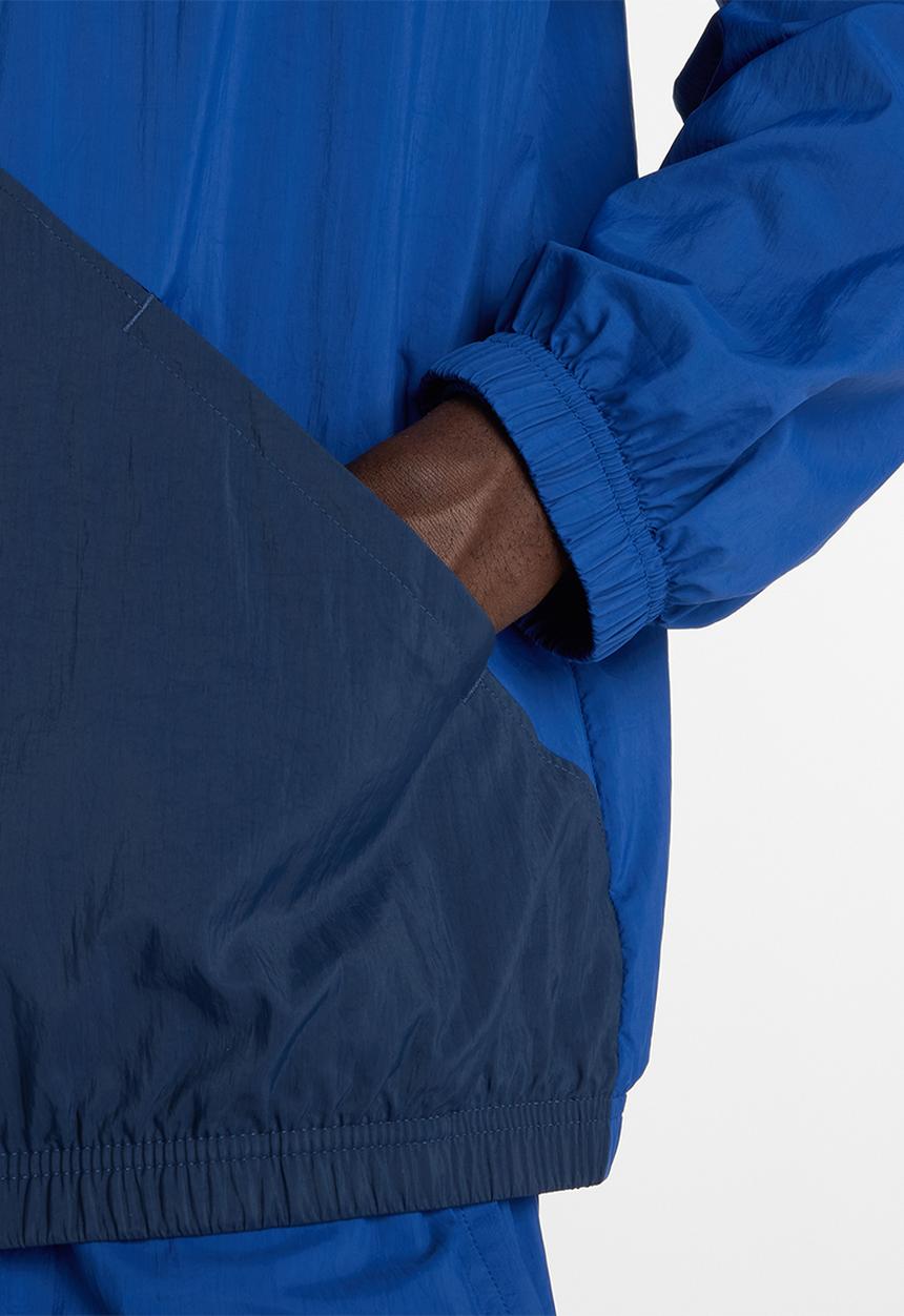 New Balance  - NB Athletics Sport Legacy Jacket - Blue