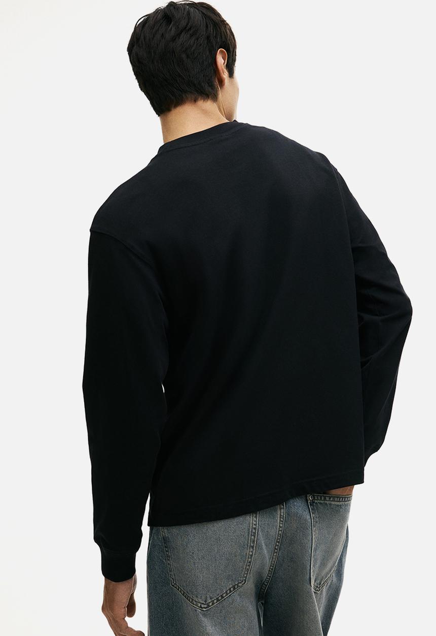H&M - Loose fit long-sleeved jersey top - black