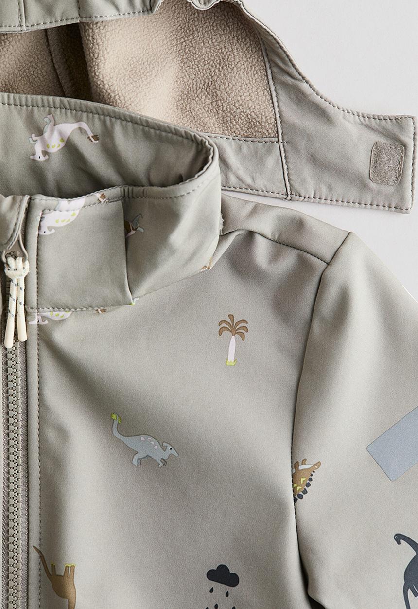 H&M - Water-resistant softshell jacket - greige/dinosaurs