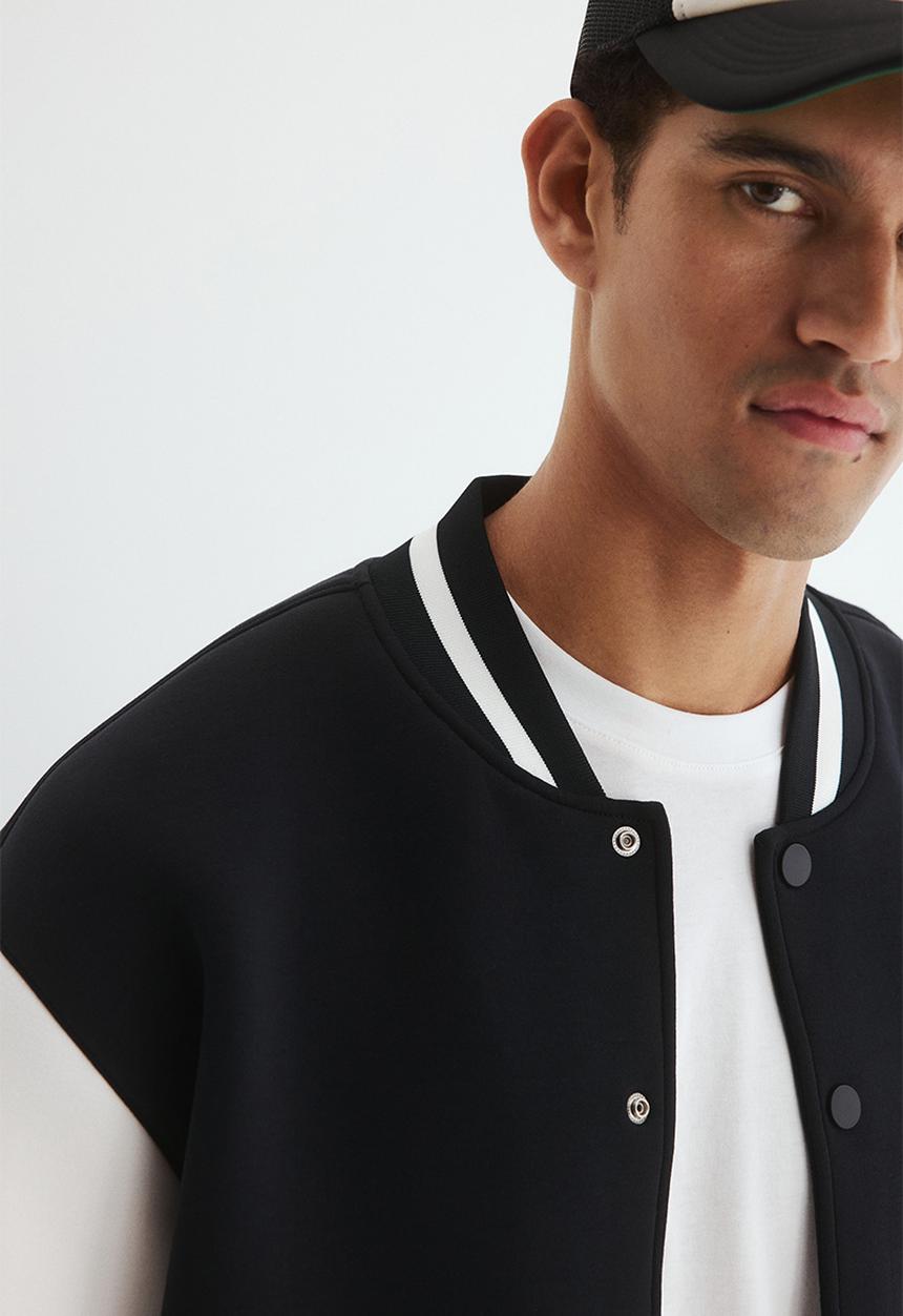 H&M - Loose fit baseball jacket - black/white