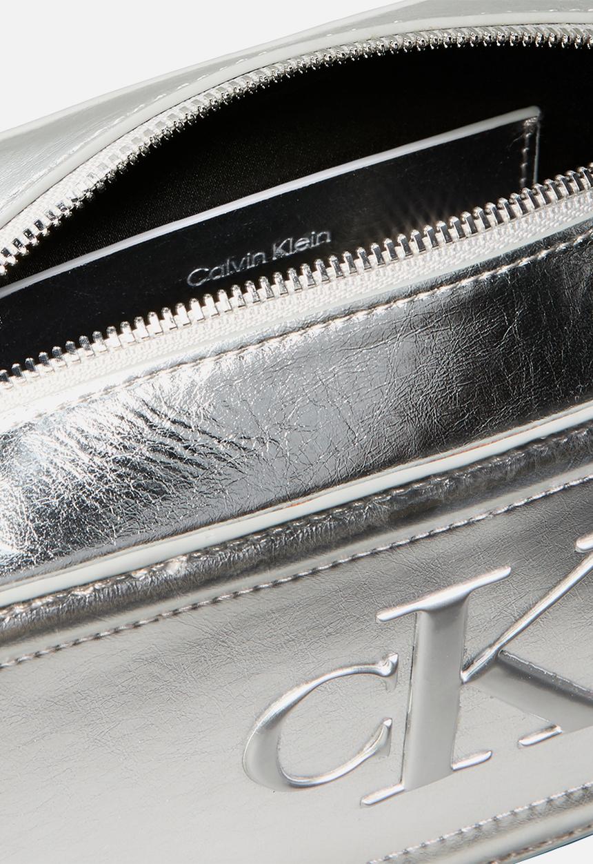 Calvin Klein - Bold ck metallic camera bag- silver metallic