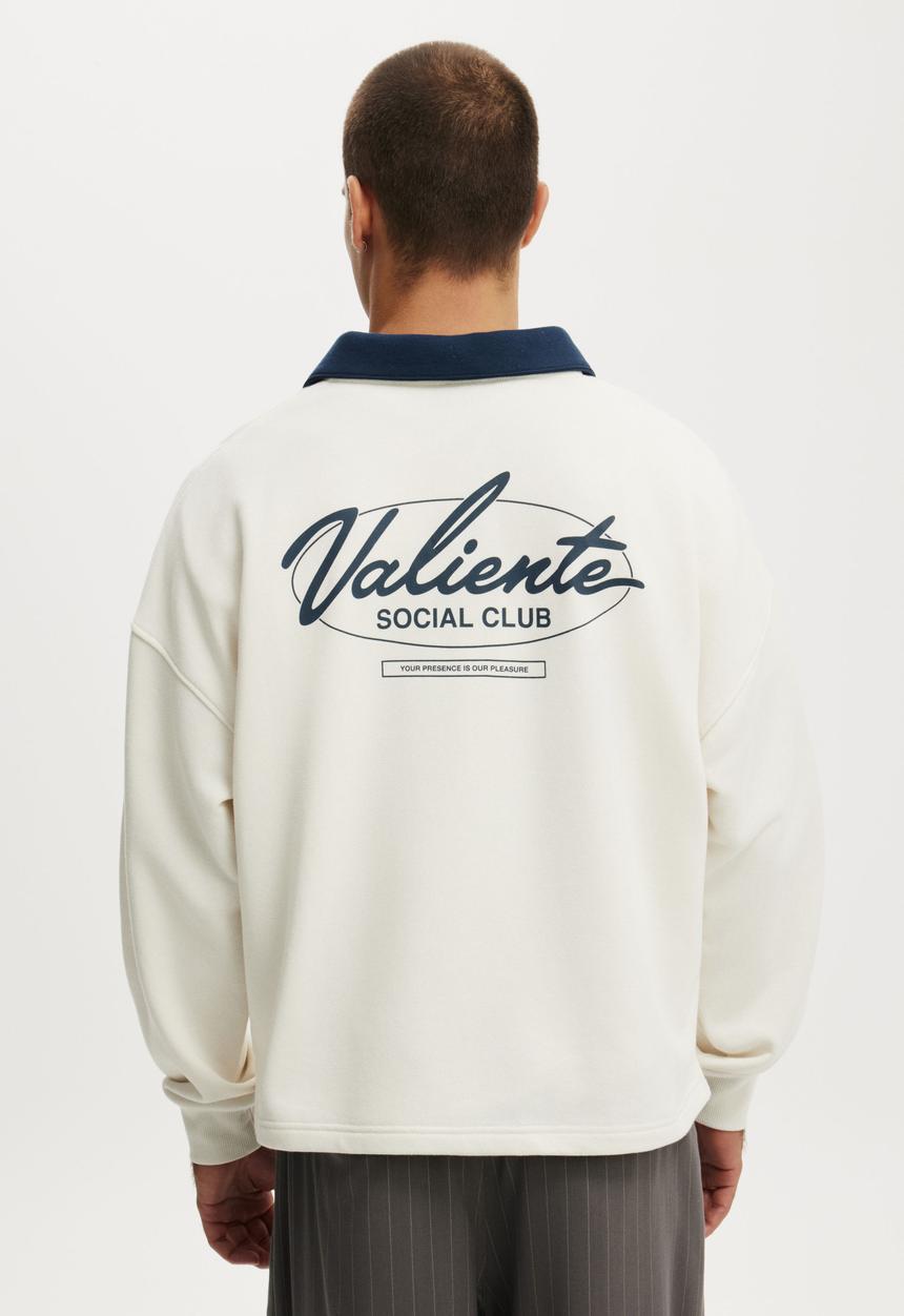 Cotton On - Cropped Fit Graphic Fleece Polo - Chalk White/Auto Navy/Valiente