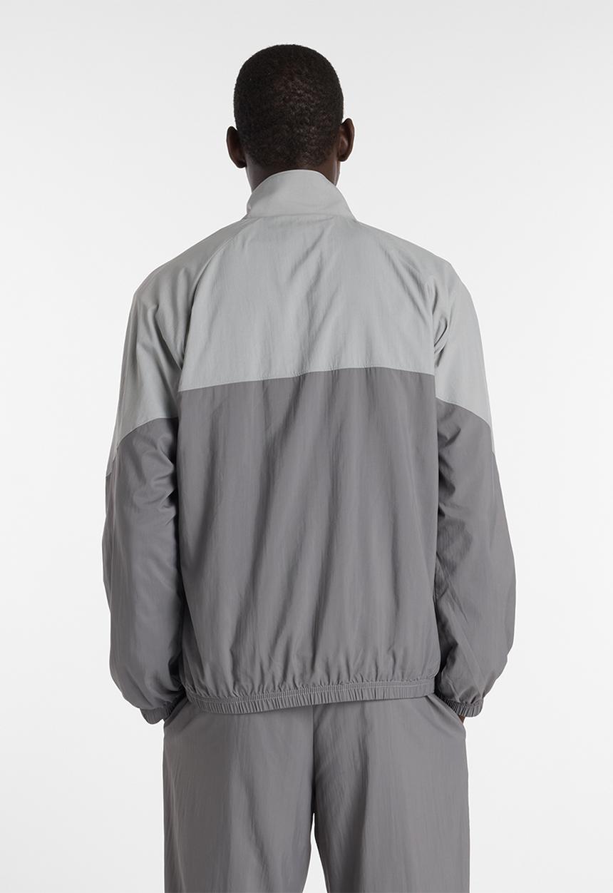 New Balance  - NB Athletics Sport Legacy Jacket - Grey