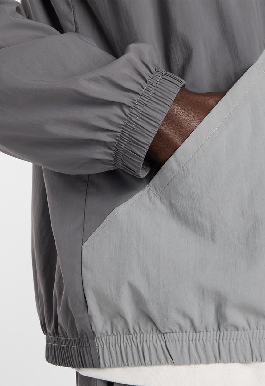 New Balance  - NB Athletics Sport Legacy Jacket - Grey
