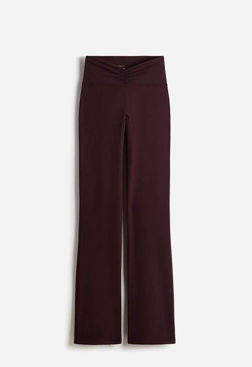 H&M - Flared yoga leggings with softmove? - chocolate plum purple