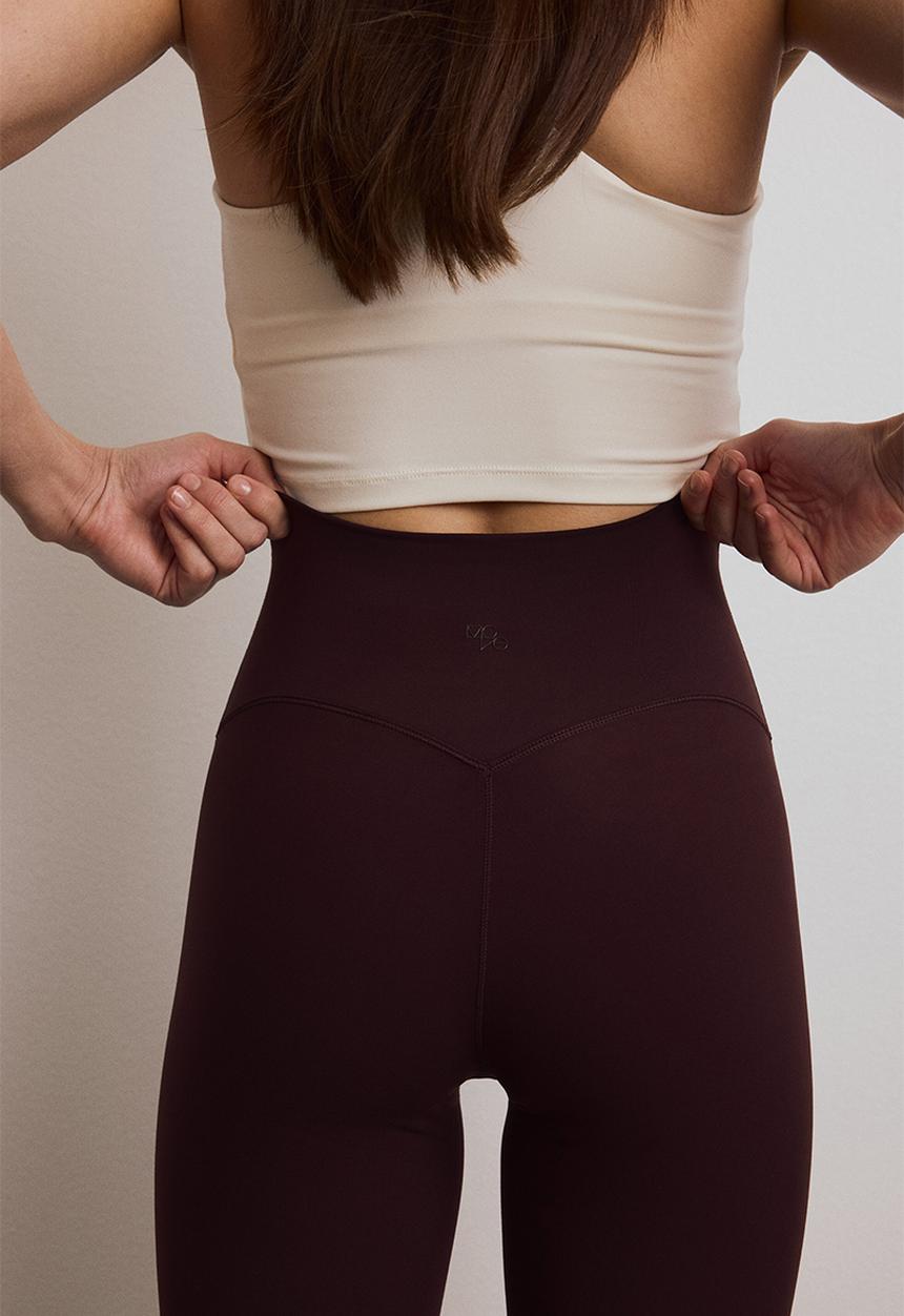 H&M - Flared yoga leggings with softmove? - chocolate plum purple